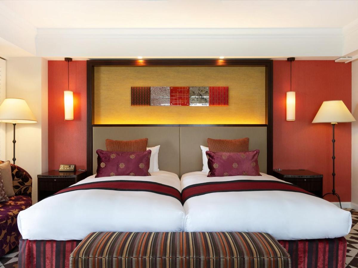 ホテル日航アリビラ 読谷村 エクステリア 写真 A bedroom at the hotel